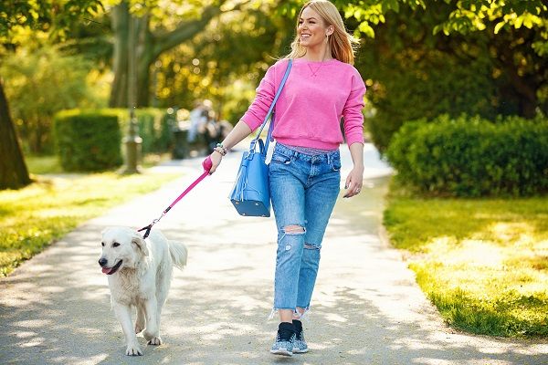 Dog walker with headphones